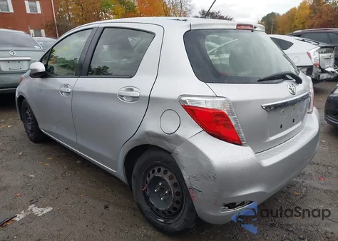 2013 Toyota Yaris Le z USA, uszkodzony, nr VIN JTDKTUD32DD551640